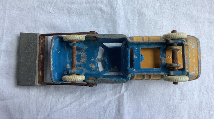 vintage New Zealand metal Tip truck with shovel toy made by Fun Ho